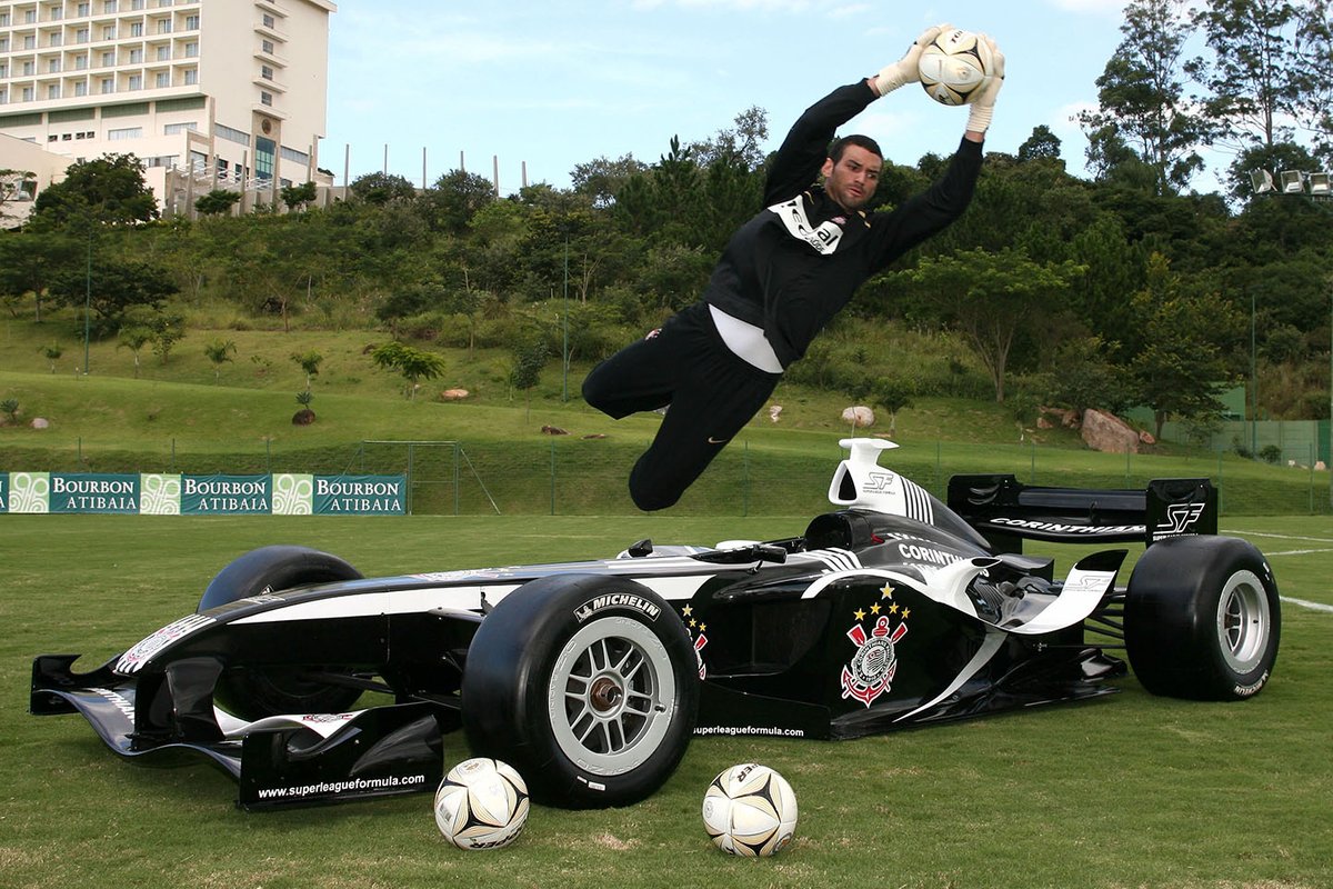 The Corinthians football team with their car