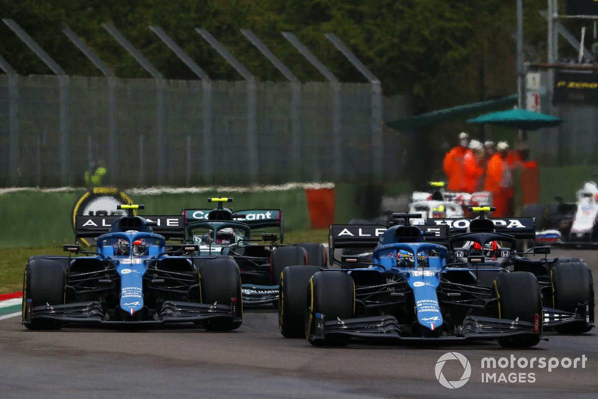 Fernando Alonso, Alpine A521, battles with Esteban Ocon, Alpine A521, at the restart
