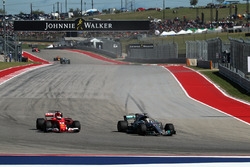Lewis Hamilton, Mercedes-Benz F1 W08 overtakes Sebastian Vettel, Ferrari SF70H to take the lead