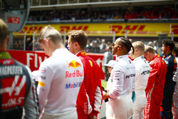 Max Verstappen, Red Bull Racing, Sebastian Vettel, Ferrari, Lewis Hamilton, Mercedes AMG F1, and Valtteri Bottas, Mercedes AMG F1, on the grid for the national anthem