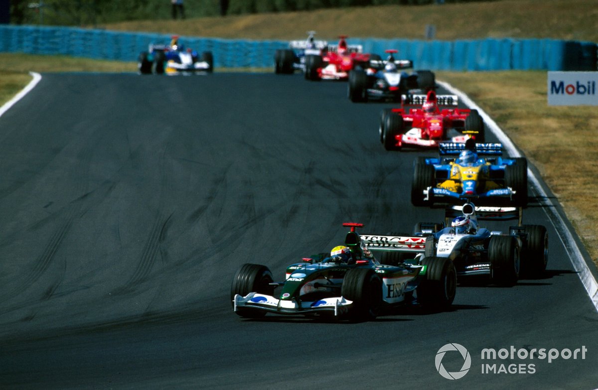 Mark Webber holds up a pack of faster cars after qualifying second on a light fuel load at the Hungaroring in 2003