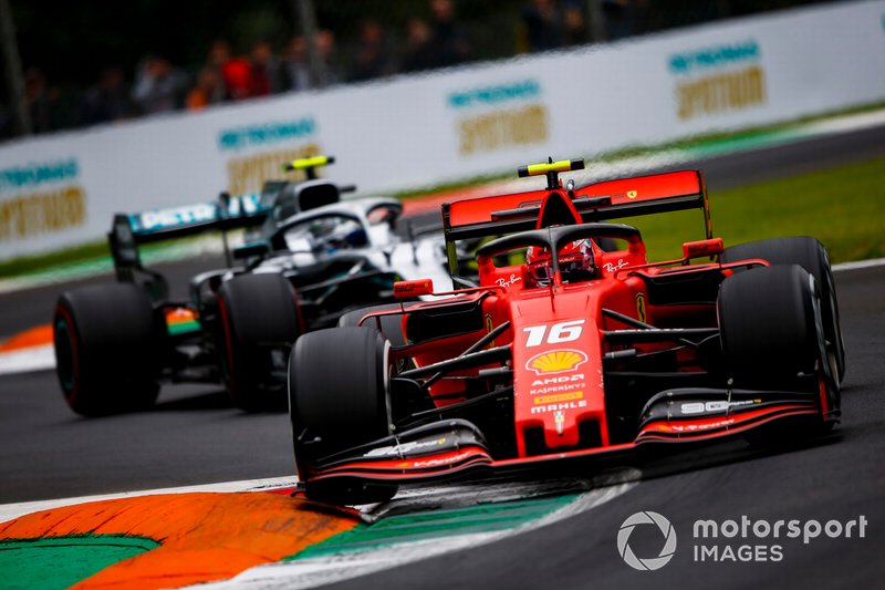 Charles Leclerc, Ferrari SF90, leads Valtteri Bottas, Mercedes AMG W10