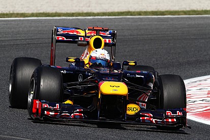 'Improving' Vettel happy at Red Bull