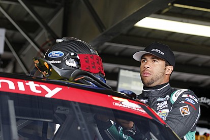 'Bubba' Wallace angry with teammate after they collide in fight for the win - video