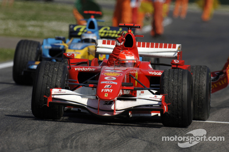 Race winner Michael Schumacher celebrates