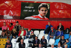Fans in the grandstand with a banner for Jules Bianchi