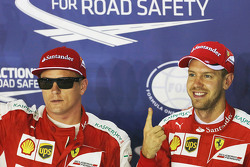 Terzo Kimi Raikkonen, Ferrari nel parco chiuso con polesitter Sebastian Vettel