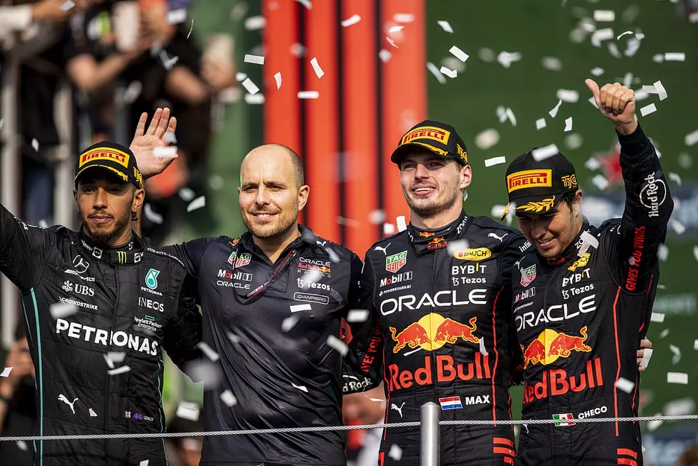 Lewis Hamilton, Mercedes AMG, 2nd position, the Red Bull trophy delegate, Max Verstappen, Red Bull Racing, 1st position, Sergio Perez, Red Bull Racing, 3rd position, on the podium