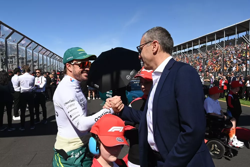 Fernando Alonso, Aston Martin F1 Team, and Stefano Domenicali, CEO, Formula One Group