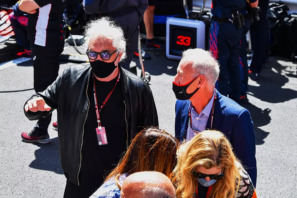 Flavio Briatore and Greg Maffei, CEO, Liberty Media Corporation, on the grid