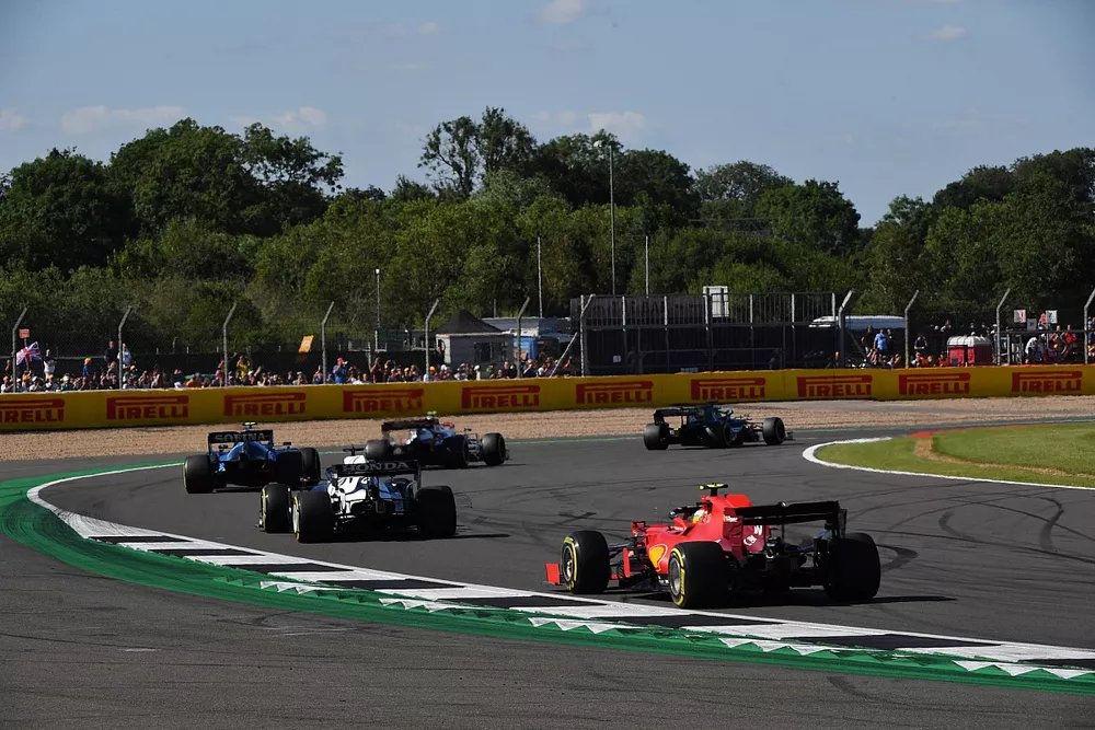 Nicholas Latifi, Williams FW43B, Yuki Tsunoda, AlphaTauri AT02, and Carlos Sainz Jr., Ferrari SF21