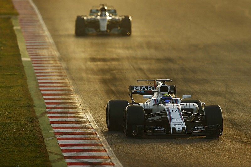 Felipe Massa, Williams FW40, leads Valtteri Bottas, Mercedes AMG F1 W08