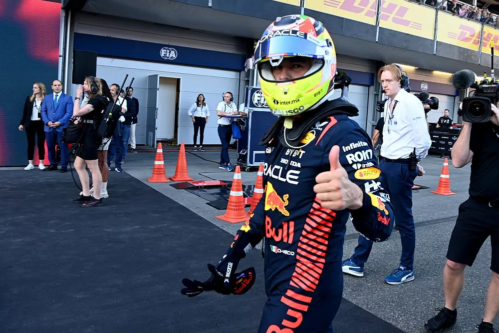Sergio Perez, Red Bull Racing, 1st position, celebrates in Parc Ferme with his team after the Sprint race