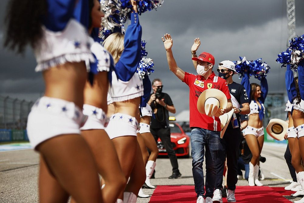 Charles Leclerc, Ferrari, and Pierre Gasly, AlphaTauri, in the drivers parade, flanked by the Dallas Cowboys Cheerleaders