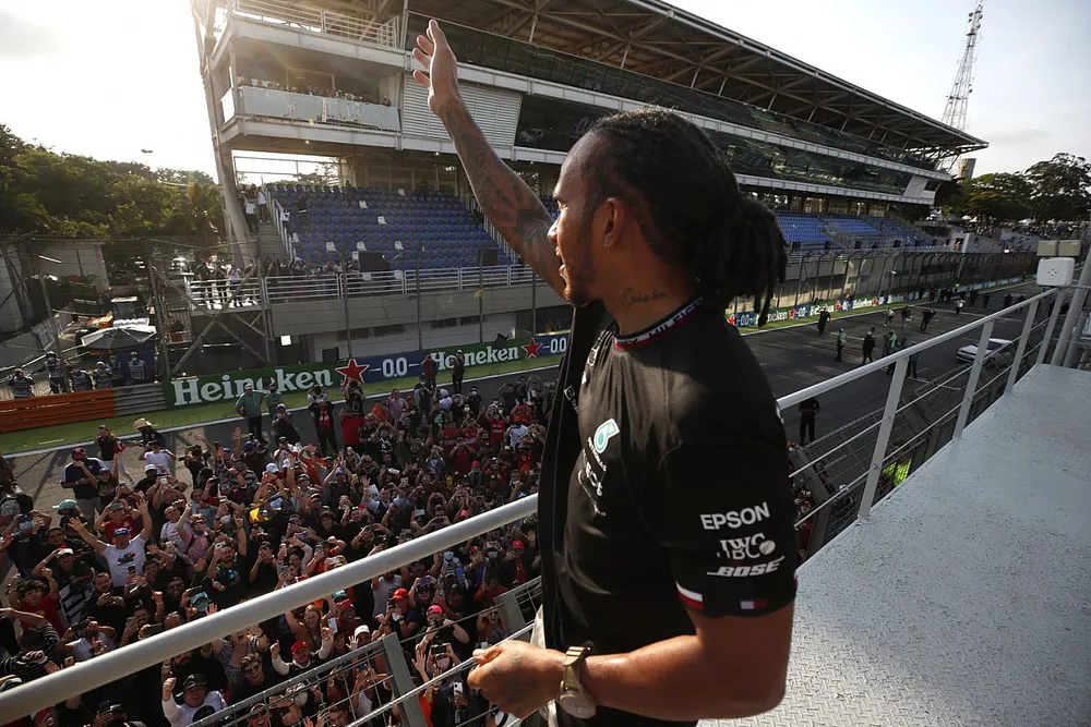 Lewis Hamilton, Mercedes, 1st position, celebrates with fans after the race