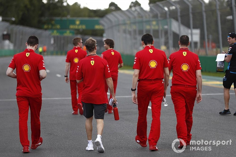 Sebastian Vettel, Ferrari walks the track with members of the team