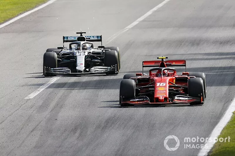 Charles Leclerc, Ferrari SF90 and Lewis Hamilton, Mercedes AMG F1 W10 battle 
