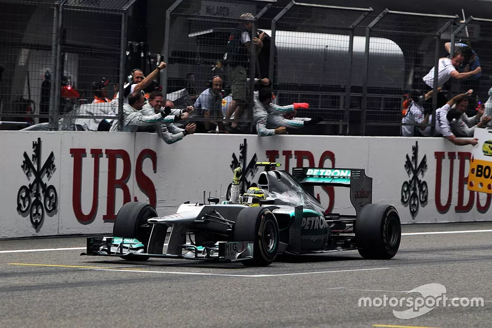 Nico Rosberg, Mercedes AMG F1 W03 crosses the line to win the race 