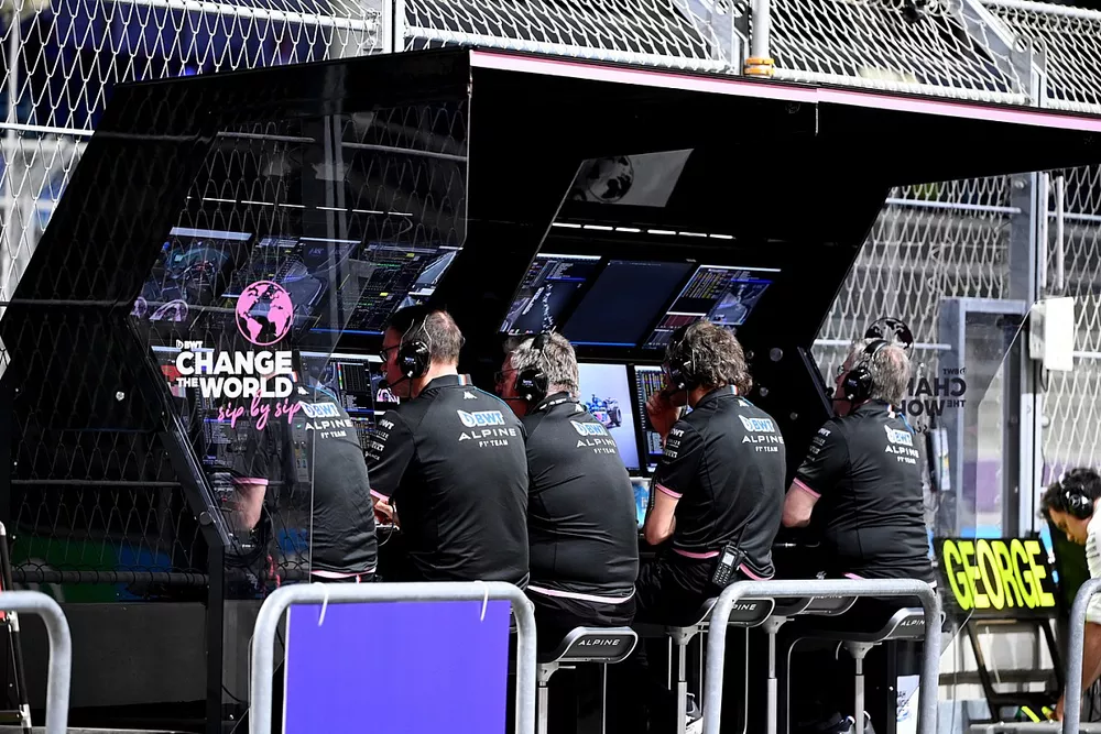 The Alpine team on the pit wall
