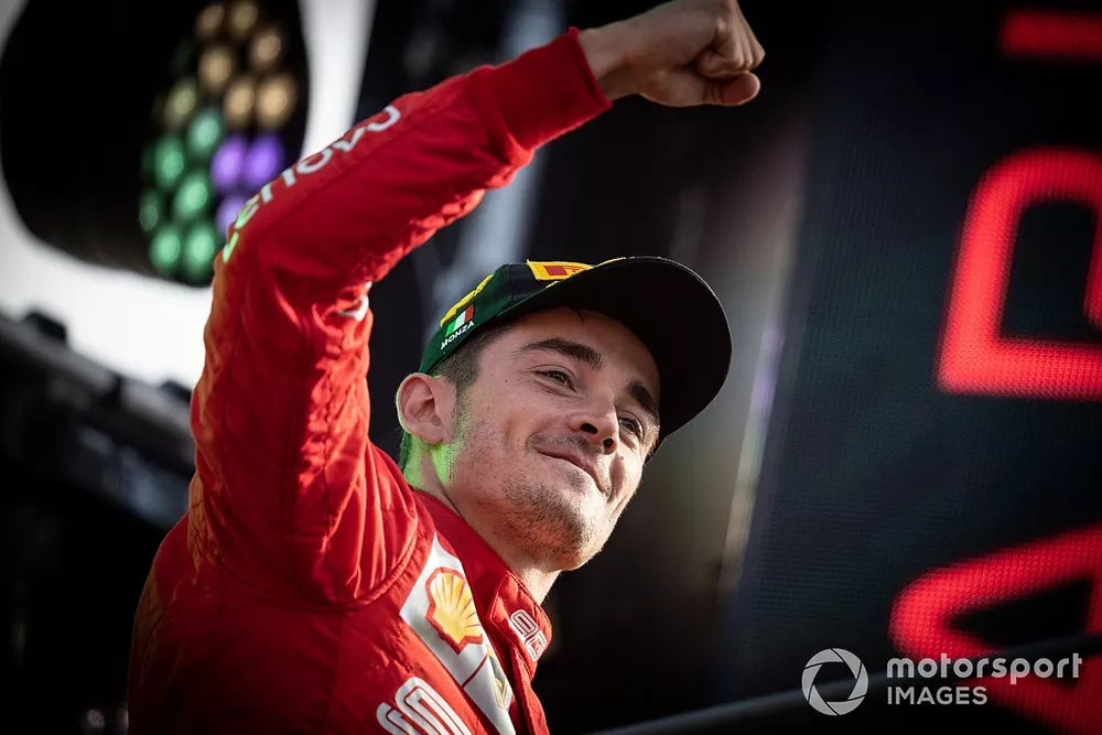 Race winner Charles Leclerc, Ferrari, celebrates on the podium