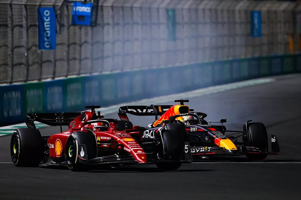 Charles Leclerc, Ferrari F1-75, Max Verstappen, Red Bull Racing RB18, battle for the lead