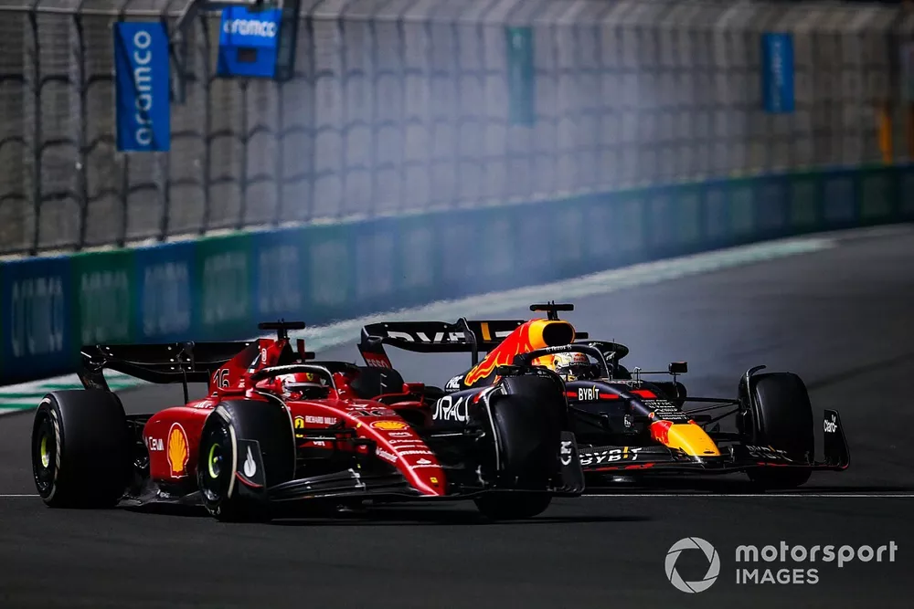 Charles Leclerc, Ferrari F1-75, Max Verstappen, Red Bull Racing RB18, battle for the lead