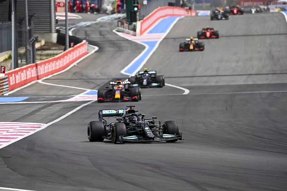 Lewis Hamilton, Mercedes W12, Max Verstappen, Red Bull Racing RB16B, and Valtteri Bottas, Mercedes W12