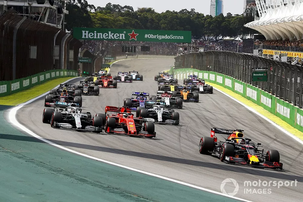 Max Verstappen, Red Bull Racing RB15 leads Lewis Hamilton, Mercedes AMG F1 W10 and Sebastian Vettel, Ferrari SF90 at the start of the race