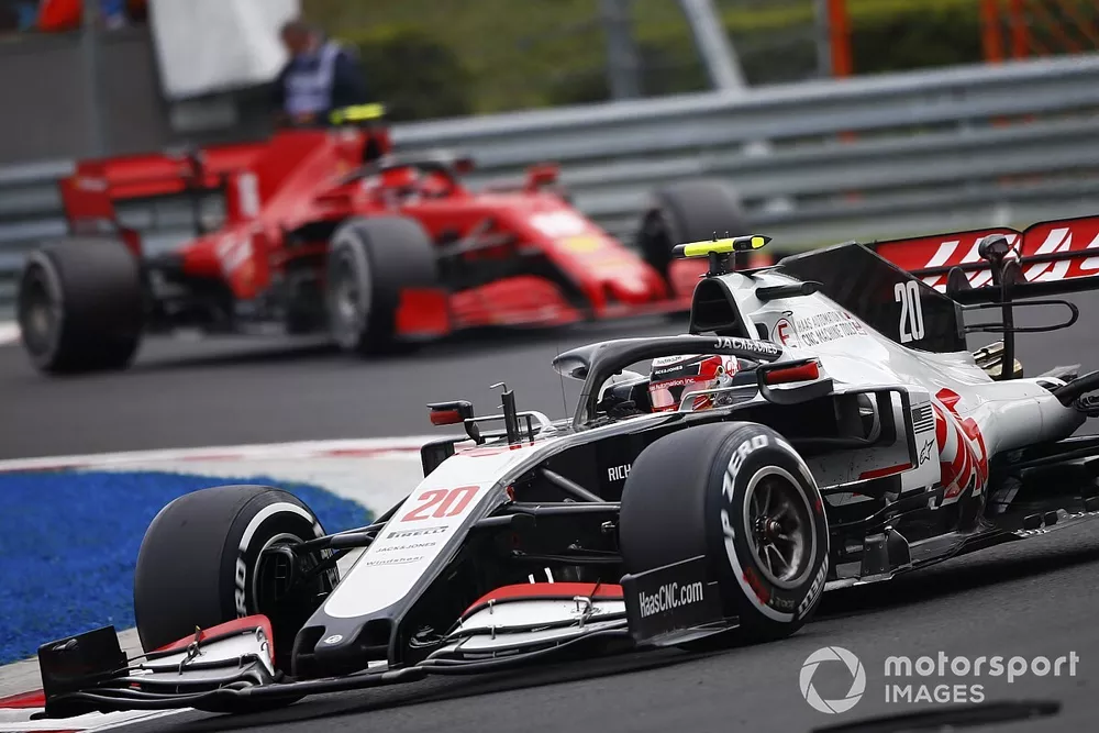 Kevin Magnussen, Haas VF-20, leads Charles Leclerc, Ferrari SF1000