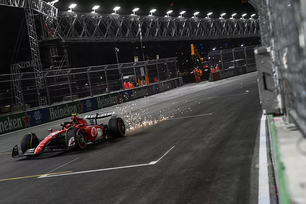 Carlos Sainz, Ferrari SF-23, trails sparks