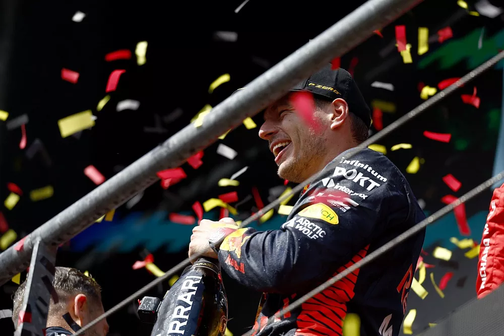 Max Verstappen, Red Bull Racing, 1st position, celebrates on the podium with Champagne