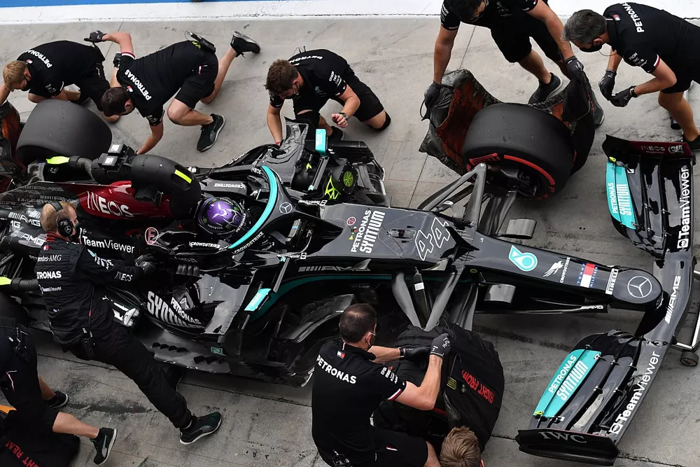 Lewis Hamilton, Mercedes W12, makes a pitstop