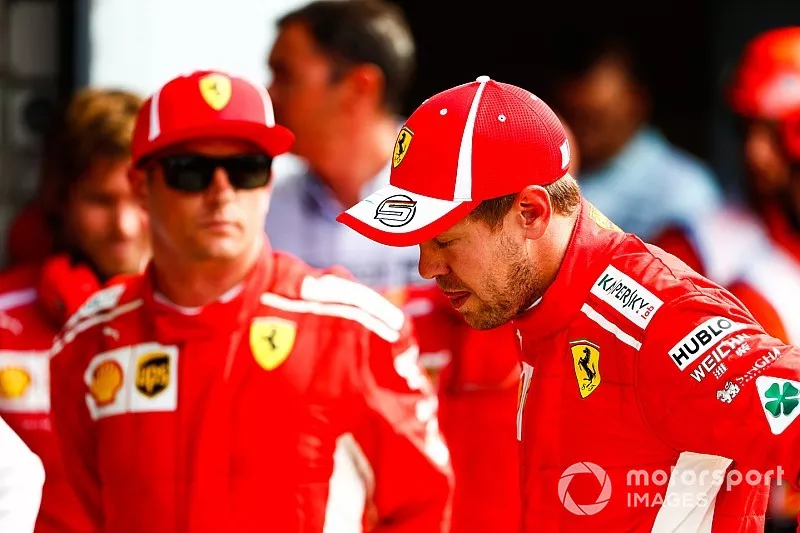 Le poleman Kimi Raikkonen, Ferrari, et Sebastian Vettel, Ferrari