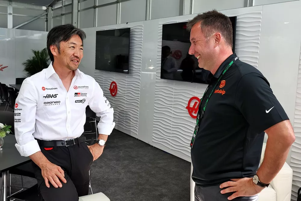 Ivan Ostojic, Infobip Chief Business Officer, with Ayao Komatsu, Haas F1 Team Principal