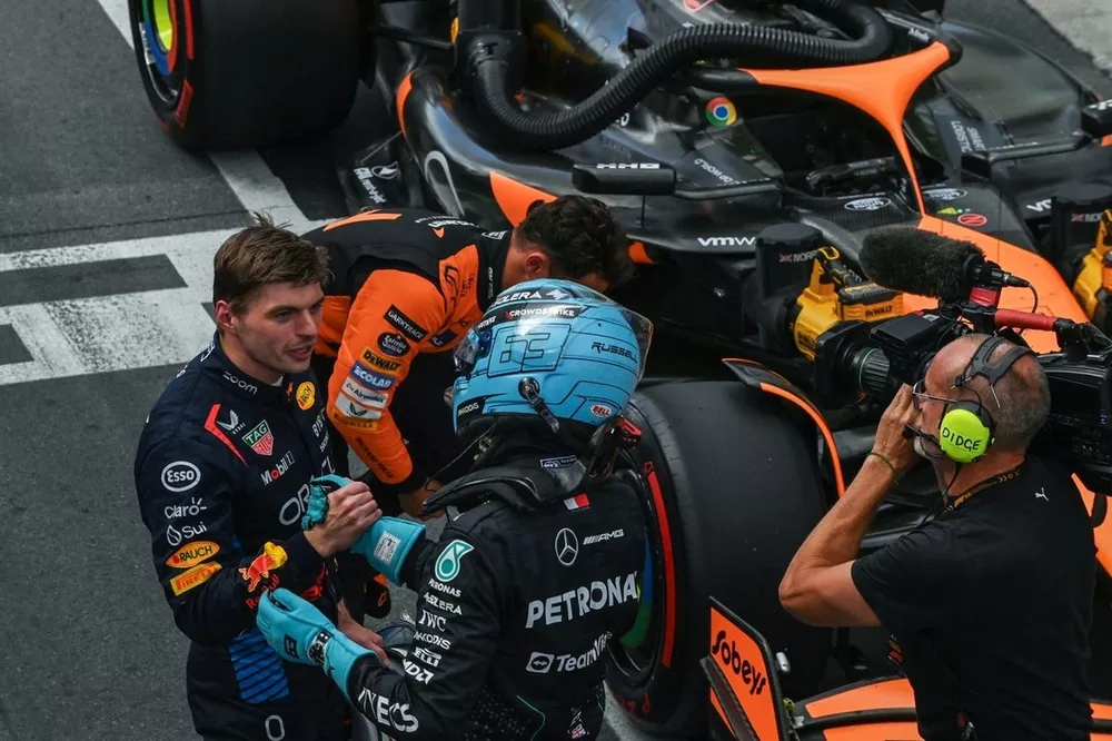 Max Verstappen, Red Bull Racing, congratulates pole man George Russell, Mercedes-AMG F1 Team, in Parc Ferme