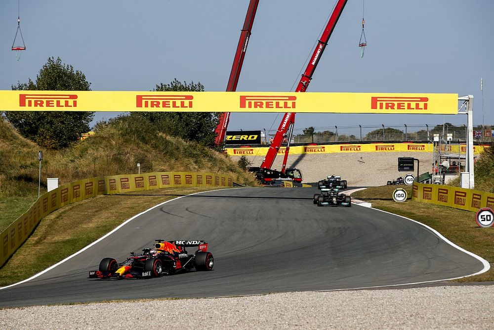 Max Verstappen, Red Bull Racing RB16B, Lewis Hamilton, Mercedes W12, and Valtteri Bottas, Mercedes W12