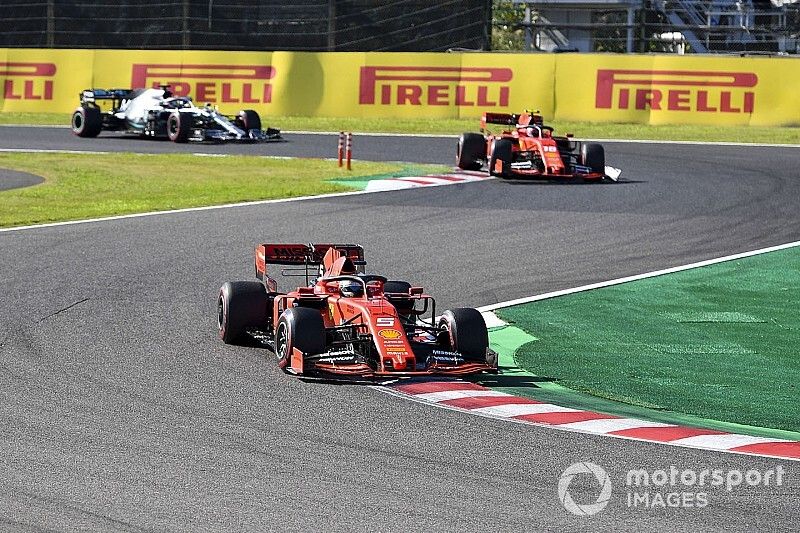 Sebastian Vettel, Ferrari SF90, leads Charles Leclerc, Ferrari SF90, and Lewis Hamilton, Mercedes AMG F1 W10