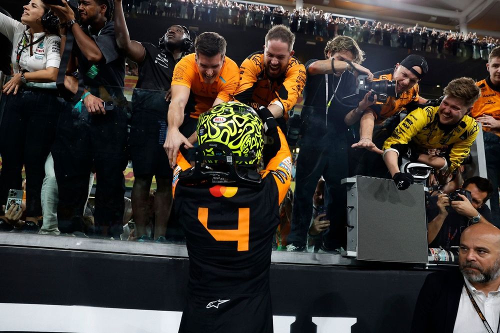 Lando Norris, McLaren F1 Team, 1st position, celebrates with his team in Parc Ferme