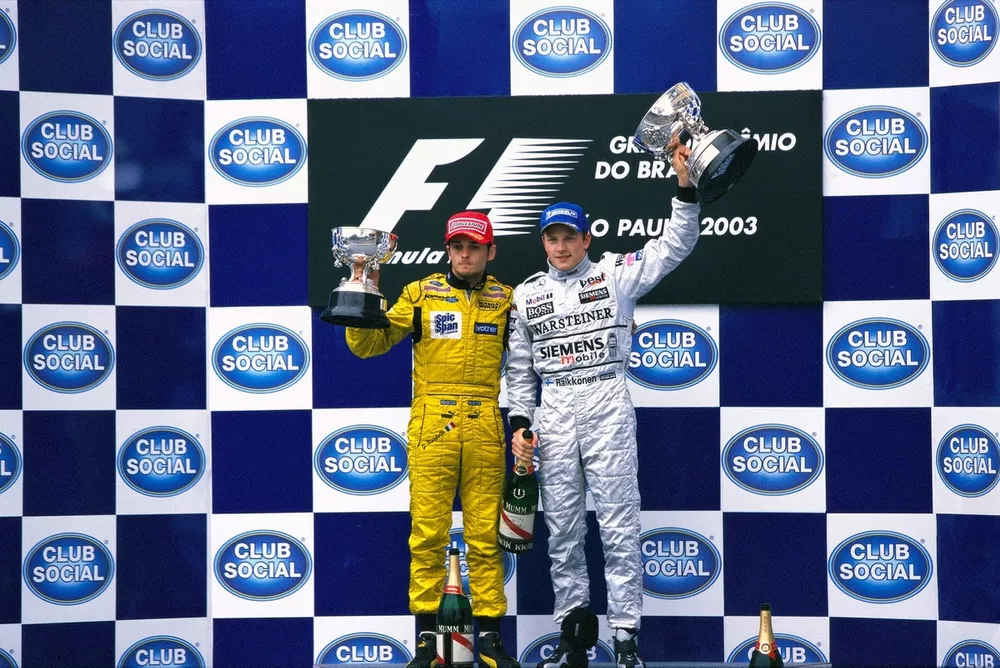 Podium: Race winner Kimi Raikk&ouml;nen, McLarenn, Giancarlo Fisichella, Jordan