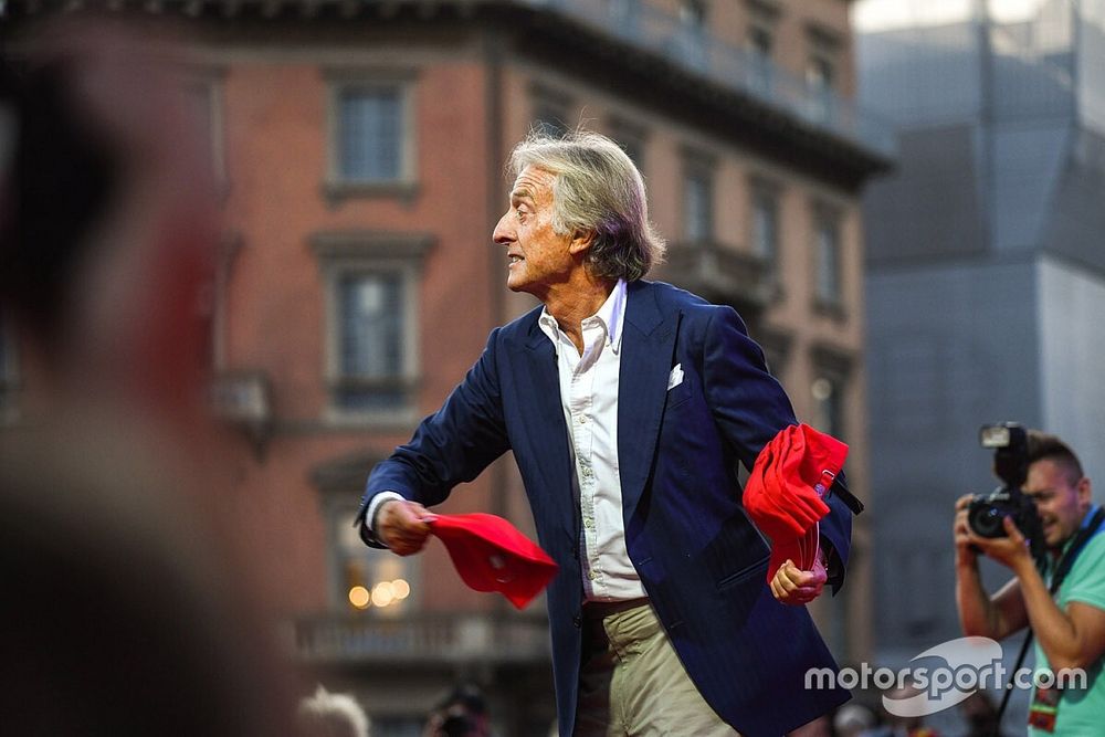 Luca di Montezemolo throws caps to the crowd