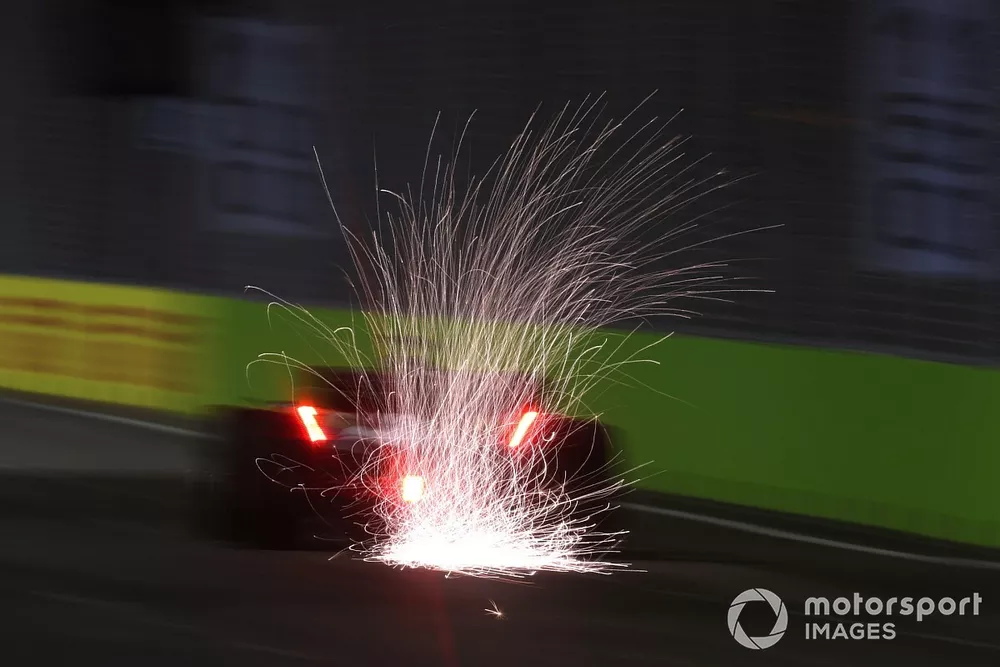 Sparks fly from Pierre Gasly, AlphaTauri AT03