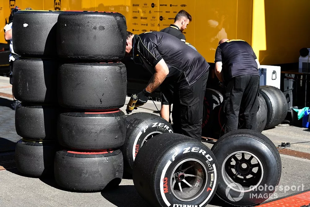 Pirelli technicians work on some tyres