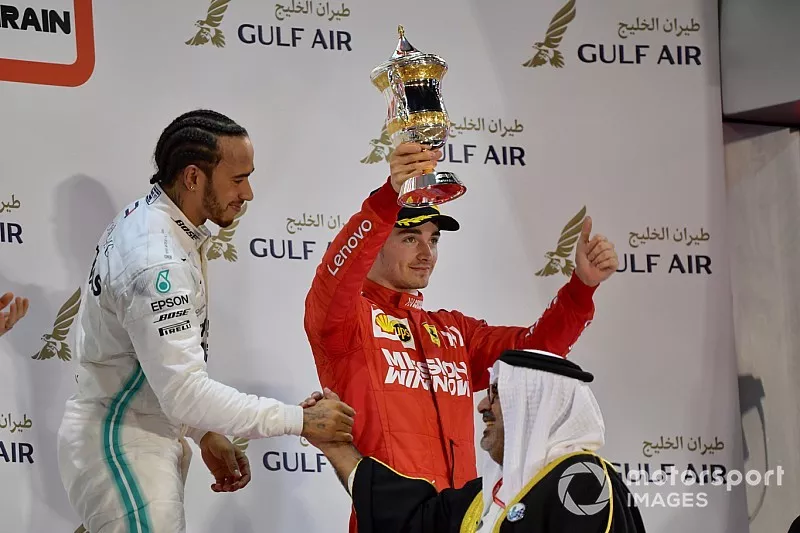 Charles Leclerc, Ferrari, 3rd position, lifts his trophy
