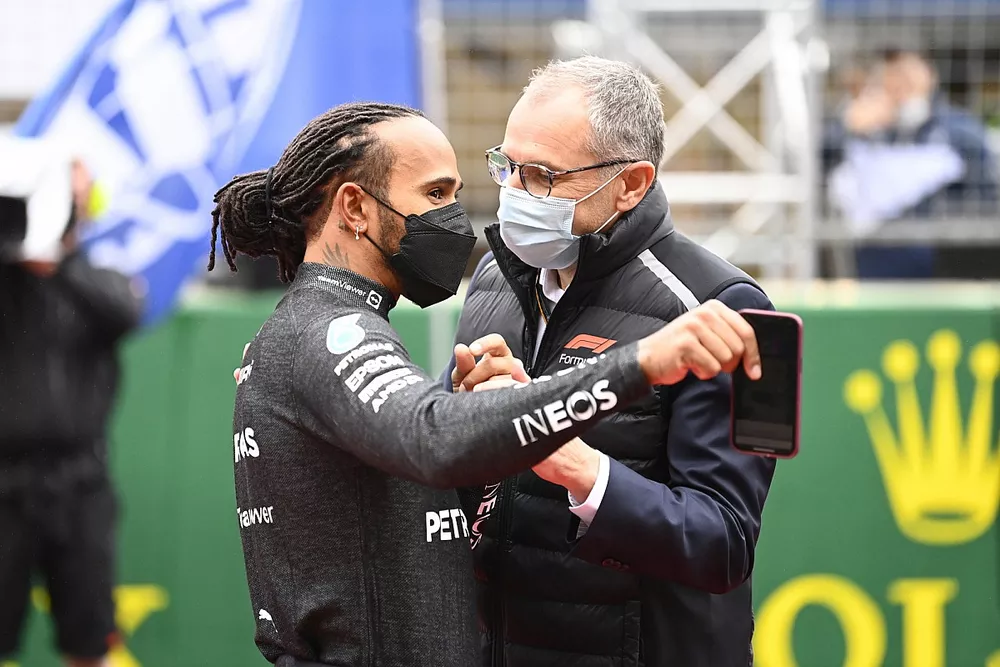 Lewis Hamilton, Mercedes, and Stefano Domenicali, CEO, Formula 1, on the grid