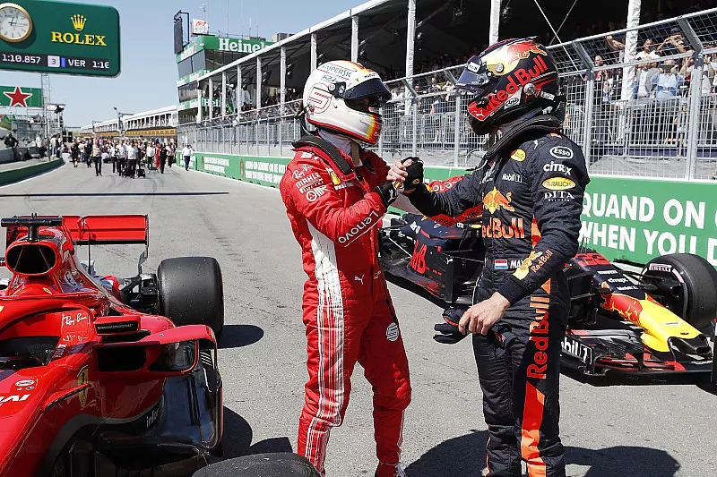 Il poleman Sebastian Vettel, Ferrari e Max Verstappen, Red Bull Racing festeggiano nel parco chiuso
