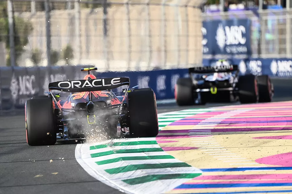 Sparks kick up from Sergio Perez, Red Bull Racing RB19