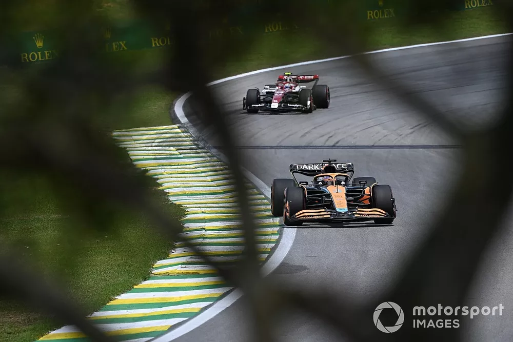 Daniel Ricciardo, McLaren MCL36, leads Zhou Guanyu, Alfa Romeo C42