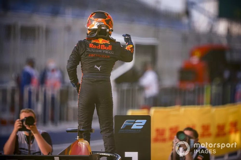 Race Winner Yuki Tsunoda, Carlin celebrates in Parc Ferme 