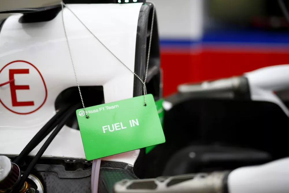 Maintenance sign denoting that a car is fuelled in the Haas F1 garage