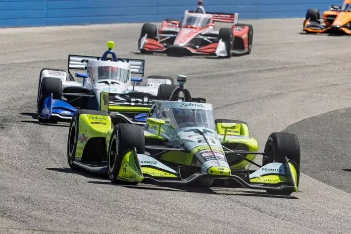 Christian Rasmussen steals maiden IndyCar win after late weather
